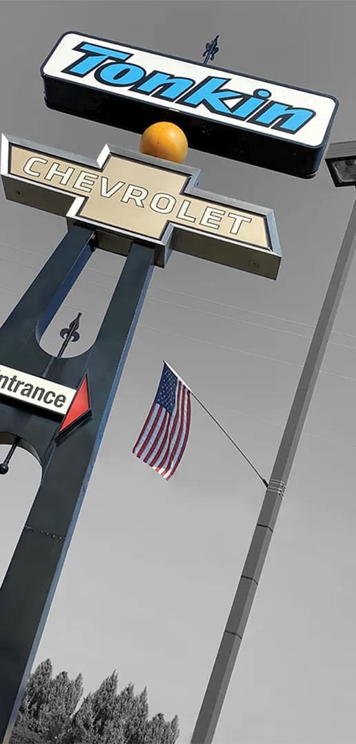 Tall Tonkin Chevrolet dealership sign pole